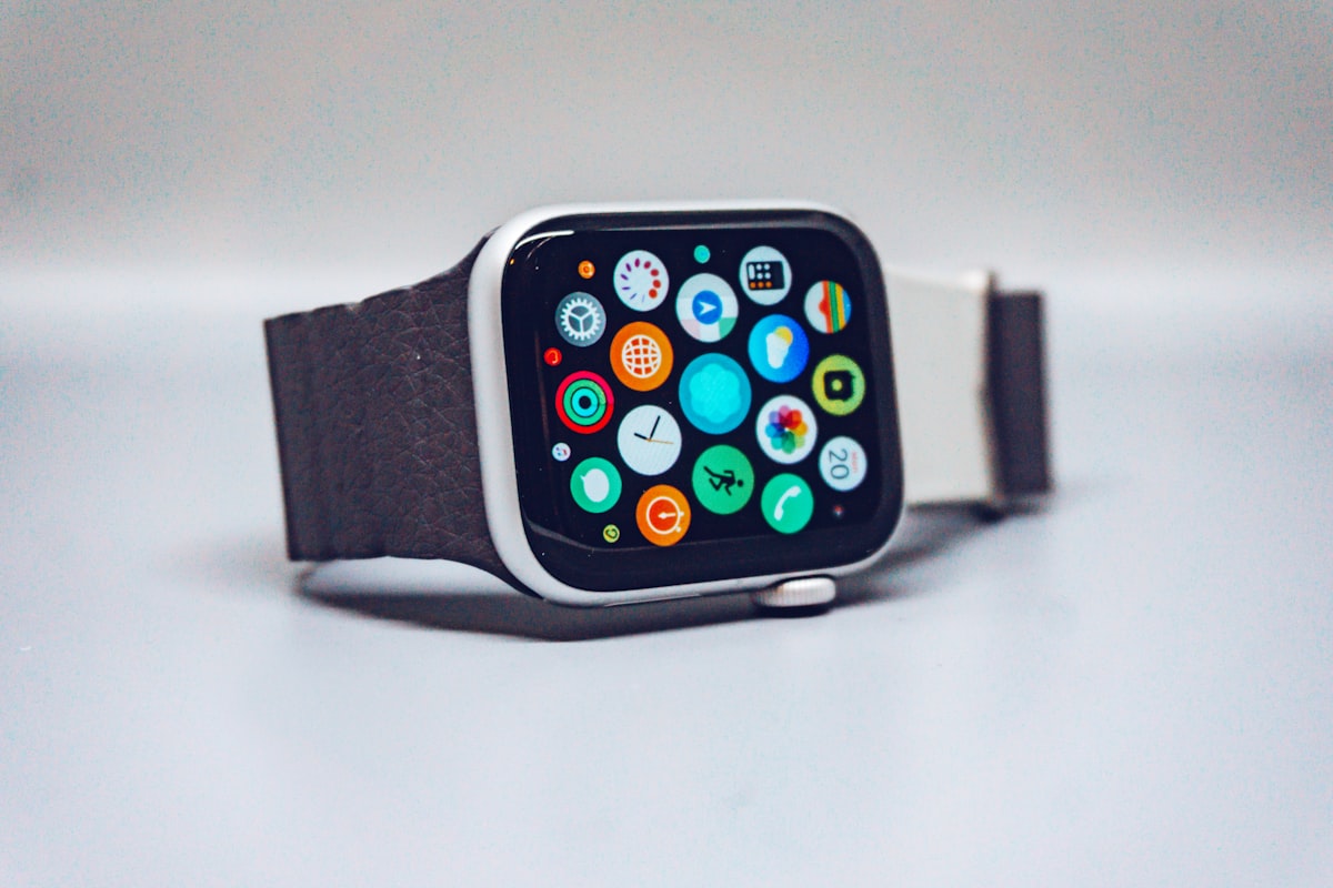 Smartwatch displaying colourful health and activity apps